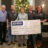 Revere’s Riders Presents Check to Ovar’coming Together